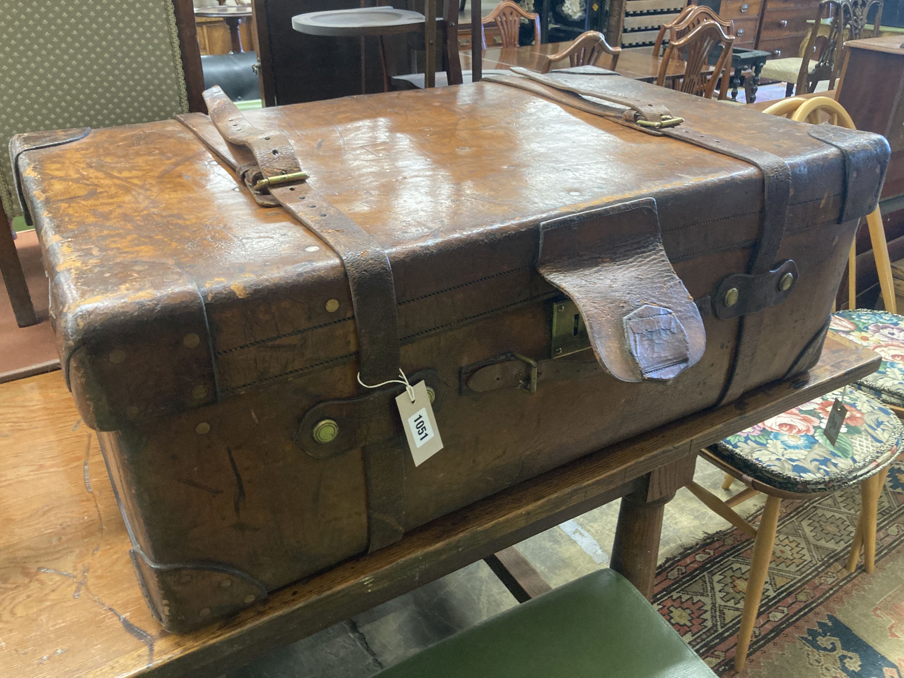 A Harrods leather trunk circa 1900, length 92cm, depth 58cm, height 33cm